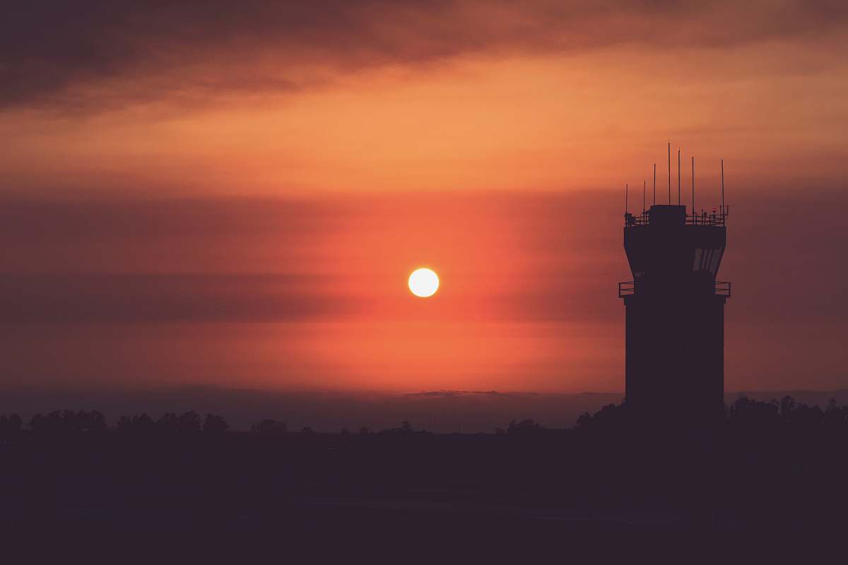sky silhouette of tower during golden hours sun